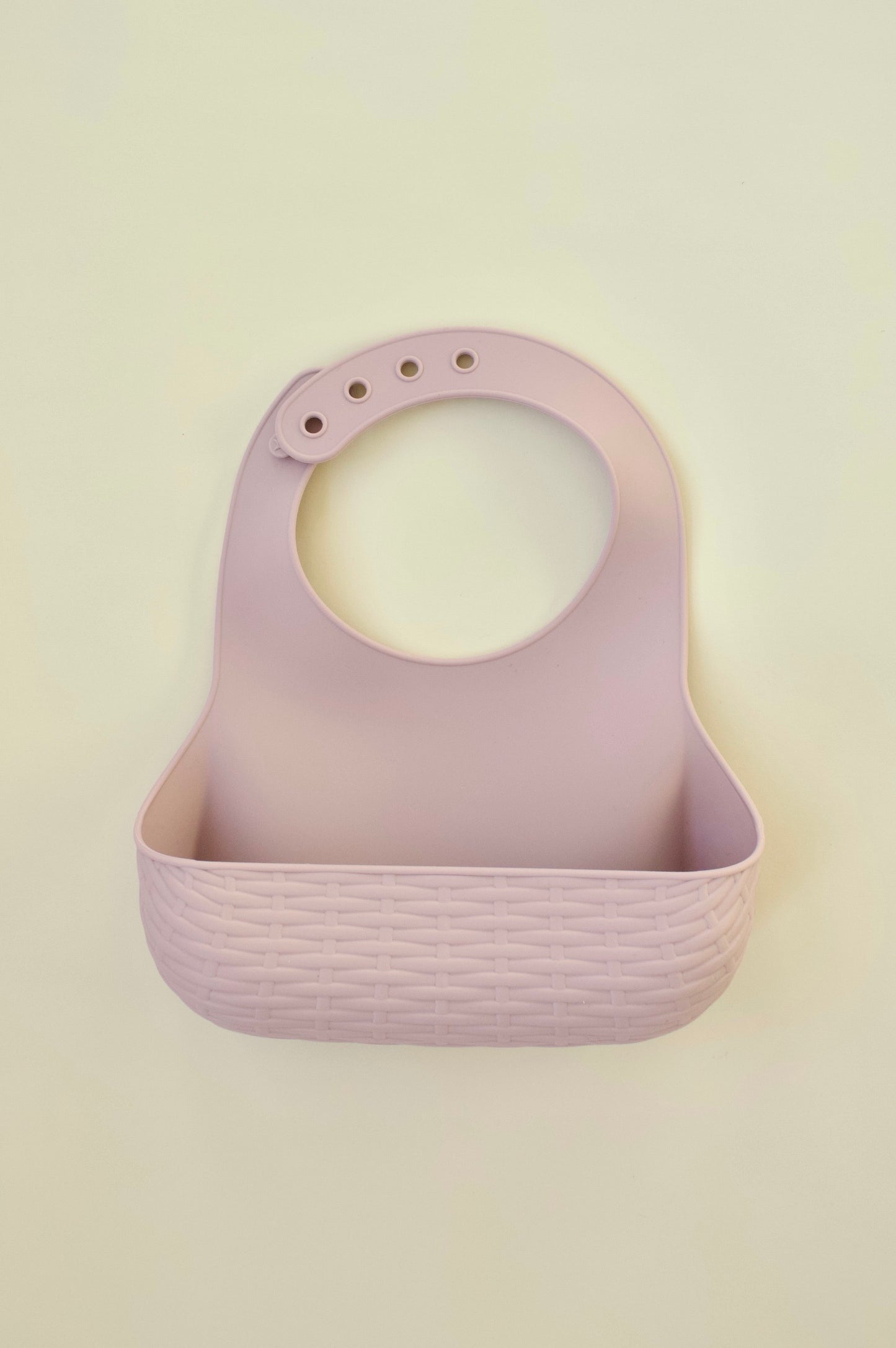 Puffling The picnic Bib, cherry blossom pink color, silicone baby bib, toddler bib, food catcher bib, mushie bib, baby mealtime, toddler mealtime, above view