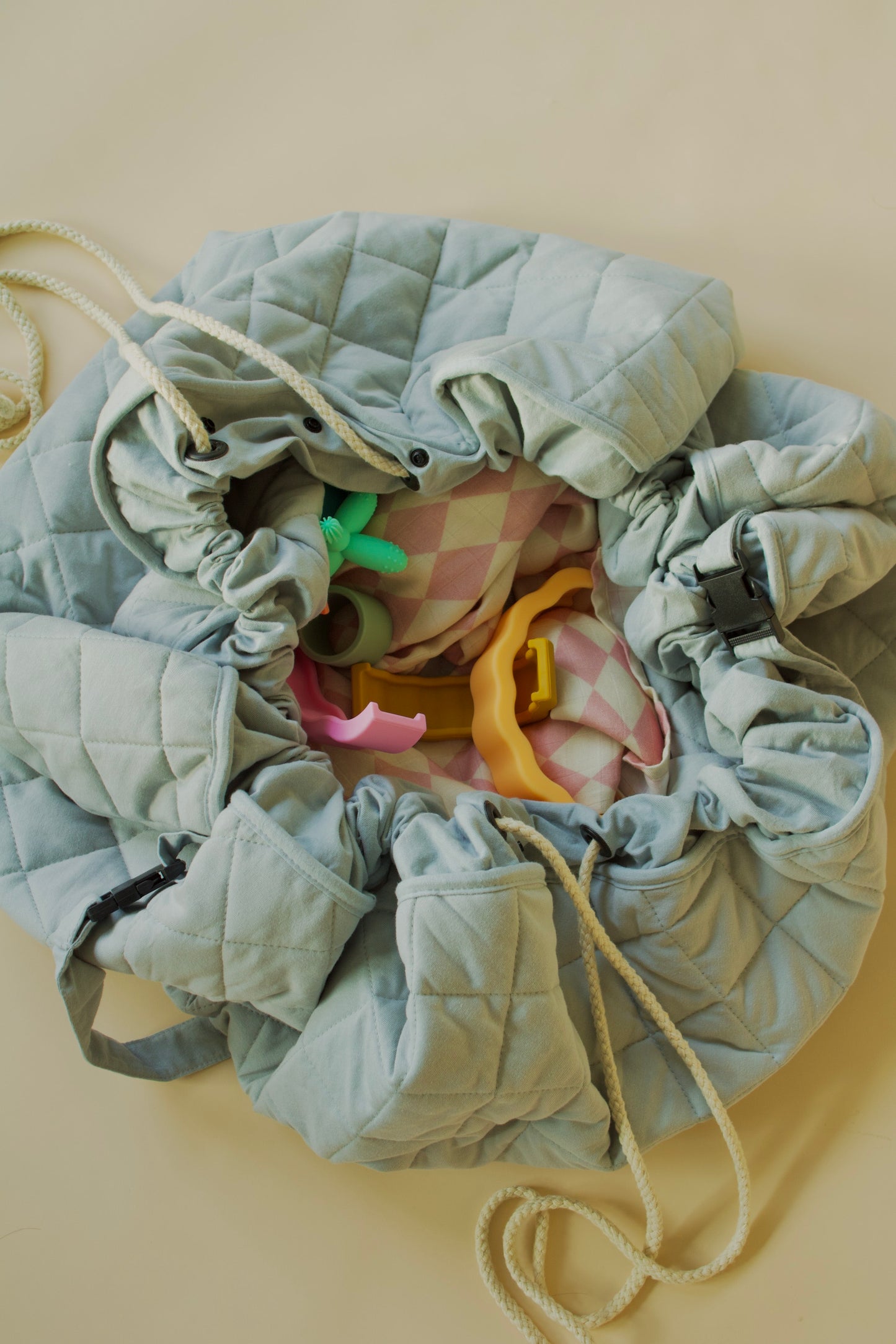 Puffling The Nomad Play Mat Storage Bag, cotton play mat, diaper bag, toy storage bag, baby play mat, closed view