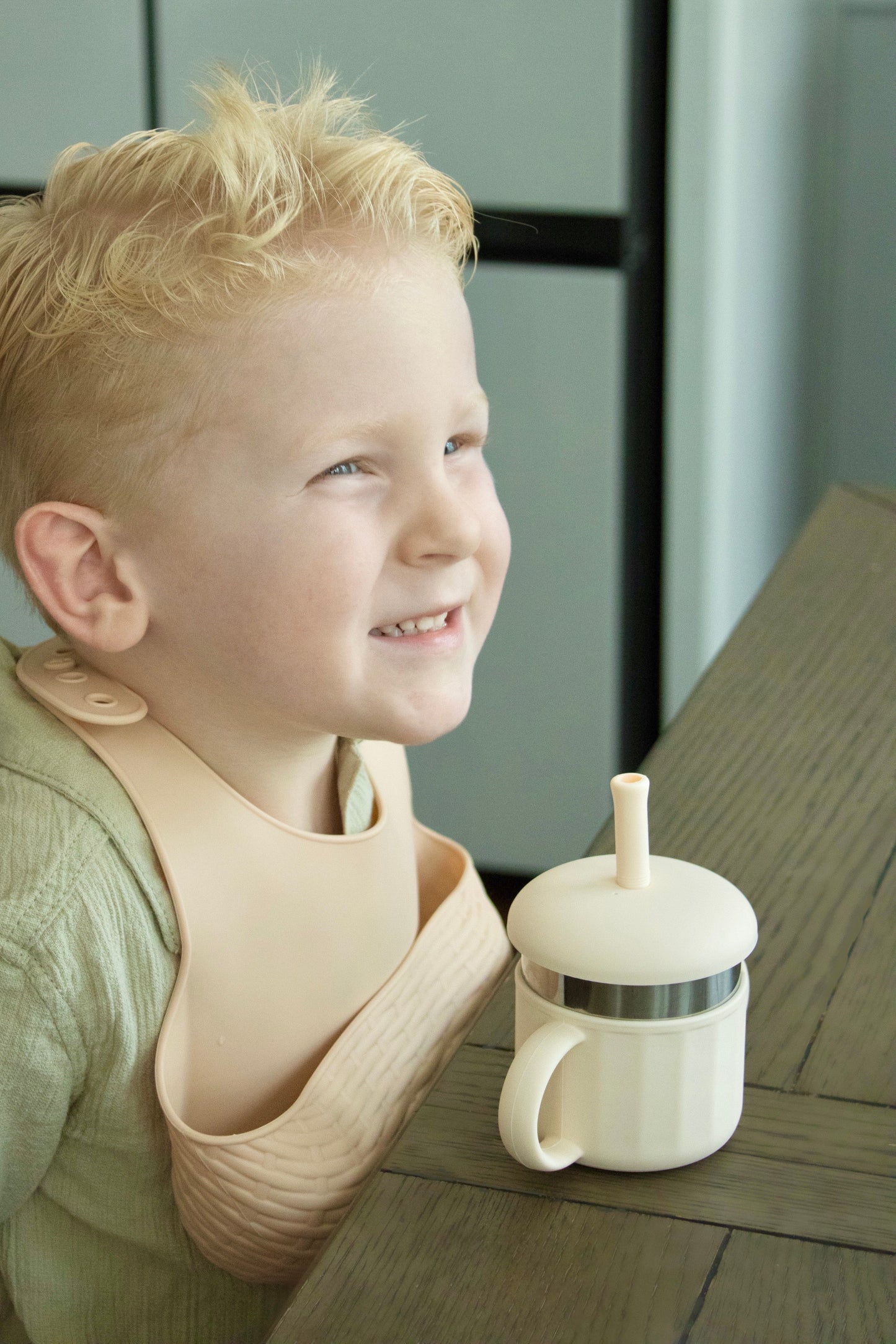 Puffling Essential Straw Cup, stainless steel sippy cup, silicone sippy cup, nontoxic toddler smoothie cup, white, coconut milk color, unbreakable, leakproof, child smiling