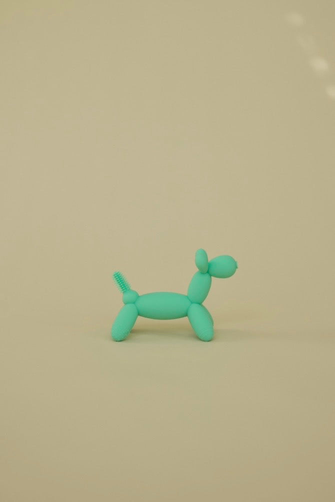 Puffling Party Animal Teether, Mint green Color, nontoxic baby teether, teething toy, silicone, mushie, mushie teether, side view