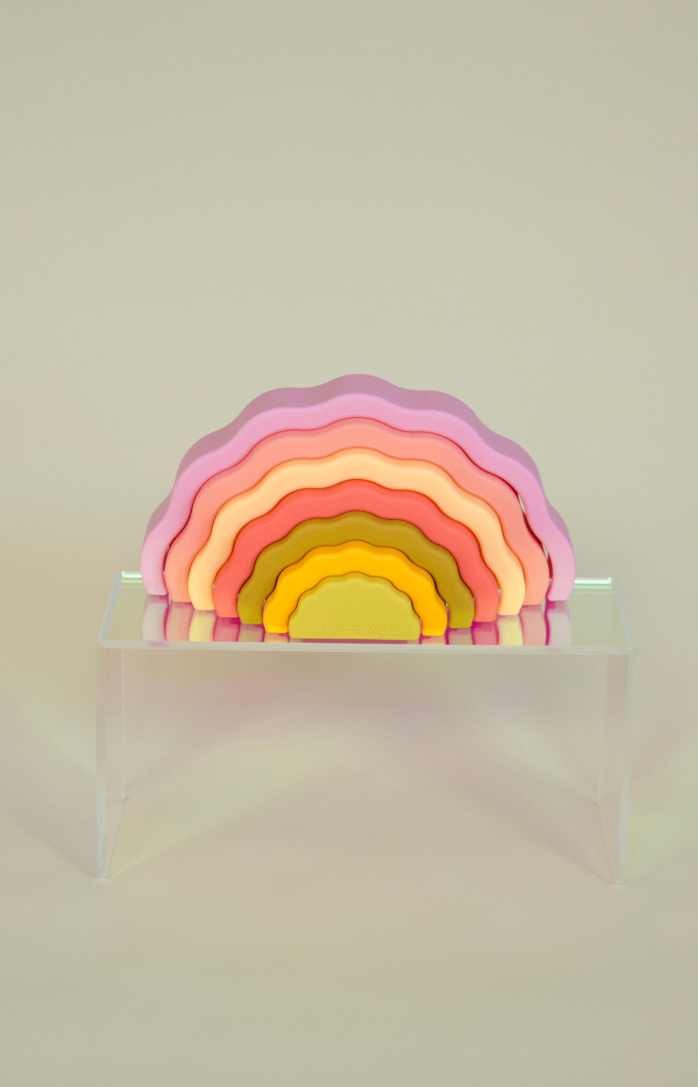 Puffling the Sunset Stacker, rainbow stacker toy, rainbow stacking toy, developmental toy, silicone toddler baby toy, nontoxic toy, wavy rainbow toy, cotton candy pink color, cocovillage, mushie toy, front view stacked up