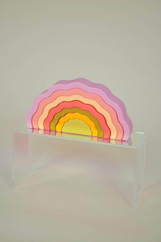 Puffling the Sunset Stacker, rainbow stacker toy, rainbow stacking toy, developmental toy, silicone toddler baby toy, nontoxic toy, wavy rainbow toy, cotton candy pink color, mushie toy, front view